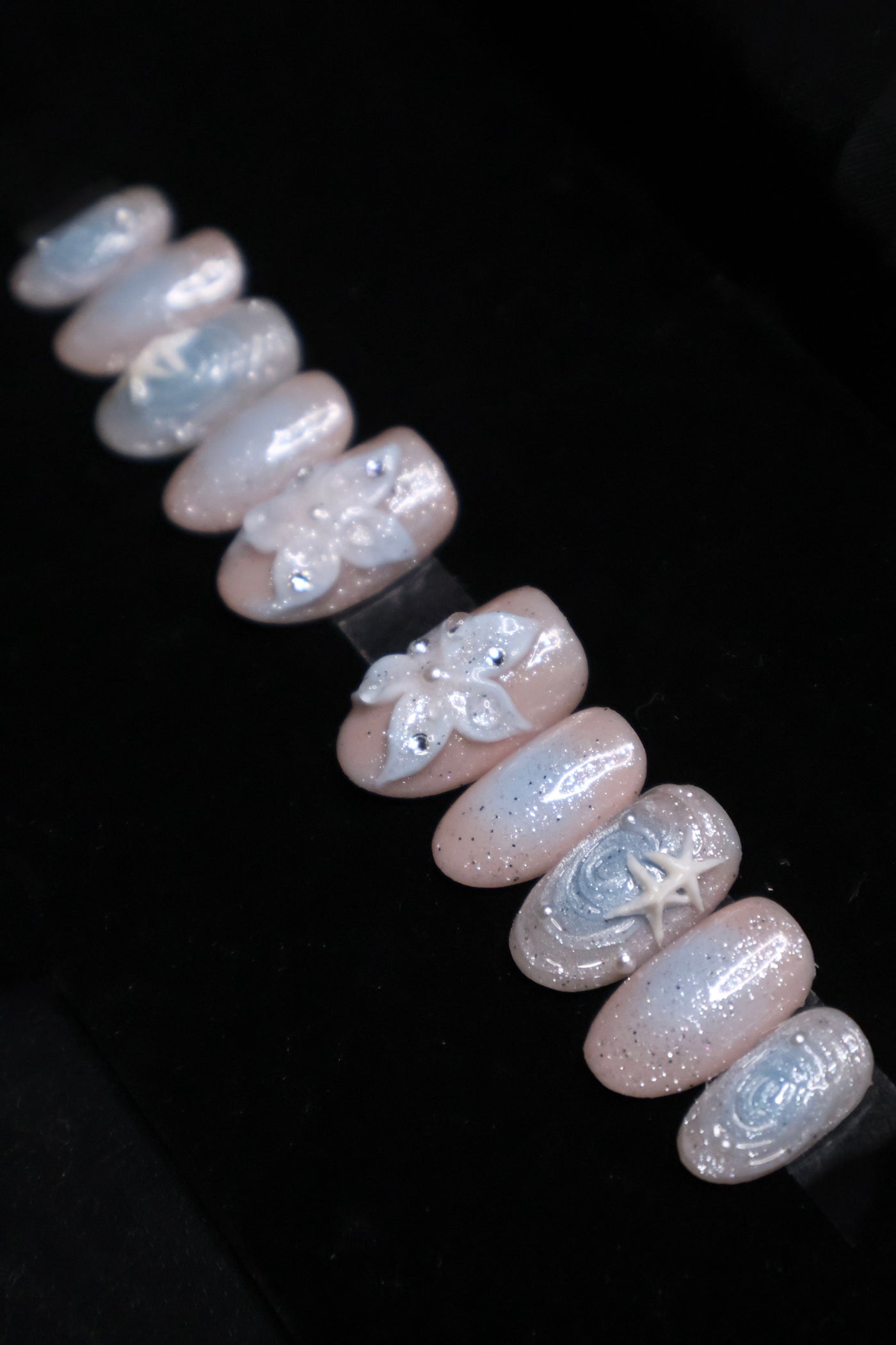 Stardust press-on set — celestial pink nude with pastel blue, glitter and 3D stars