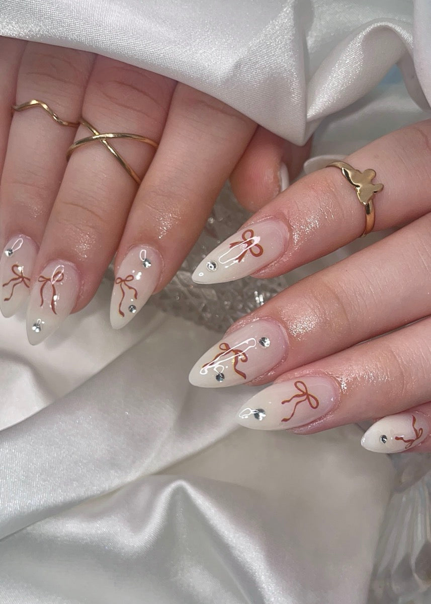 Ribbon nude — custom nail design