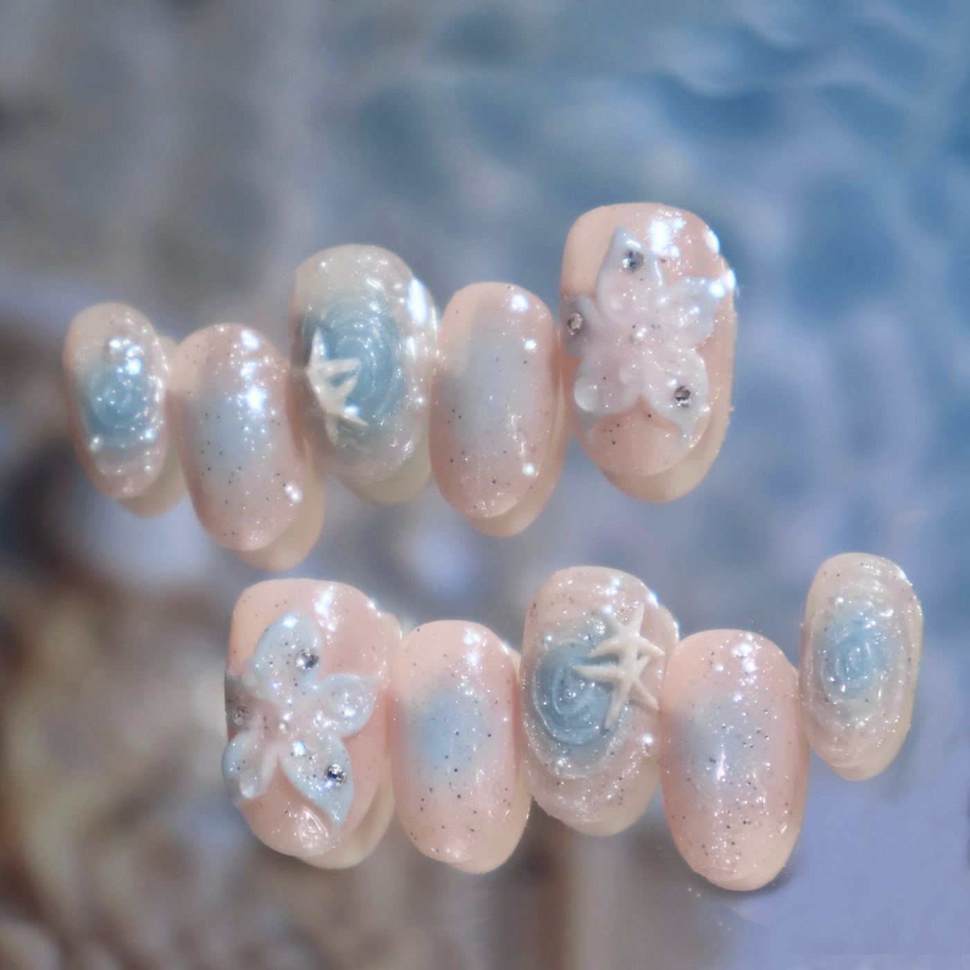 Hand-finished with 3D clear gel and pearl for a dreamy, celestial set that catches the light from every angle.
